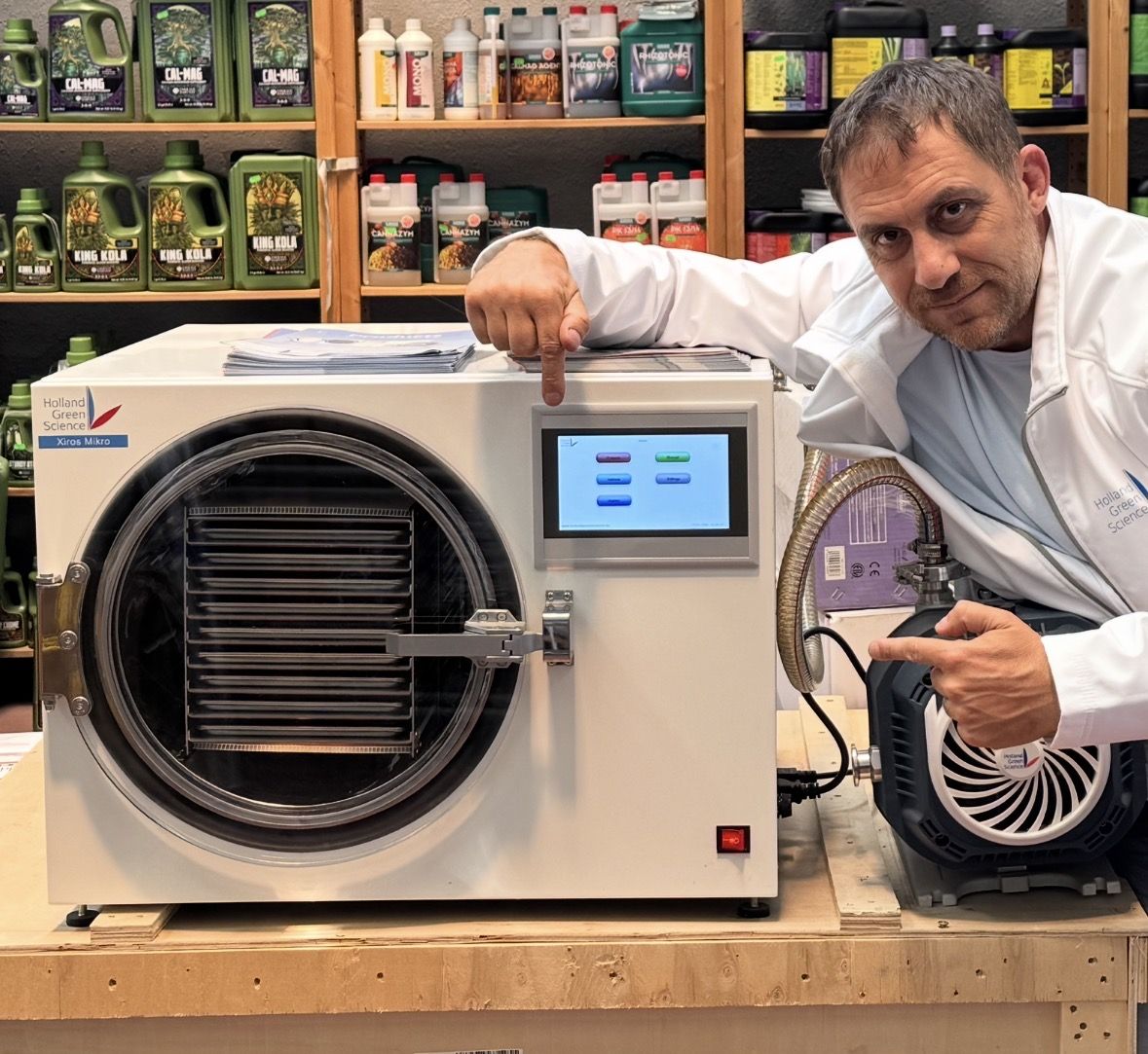 Dr. Feis beside the Holland Green Science Xiros Mikro freeze dryer